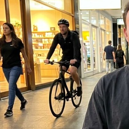 Close-up of the people in the background of the street café photo