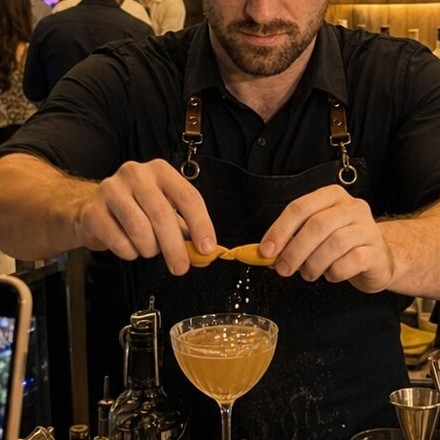 Close-up of the hands in the bartender photo